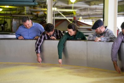 Download Tour guide shows group milled grains in the cooker