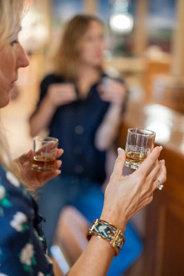 Download Woman holding glass of Buffalo Trace 