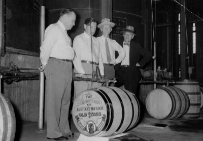 Download Group of men recognizing 2,000,000th barrel