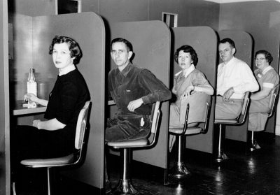 Download A historic black and white photo of a group tour tasting at Buffalo Trace Distillery intended for media kit usage.