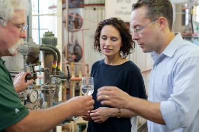 Download A picture of a tour looking at and tasting White Dog at Buffalo Trace Distillery intended for media kit usage.