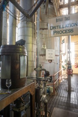 Download A picture of a still and the distillation process sign intended for media kit usage.
